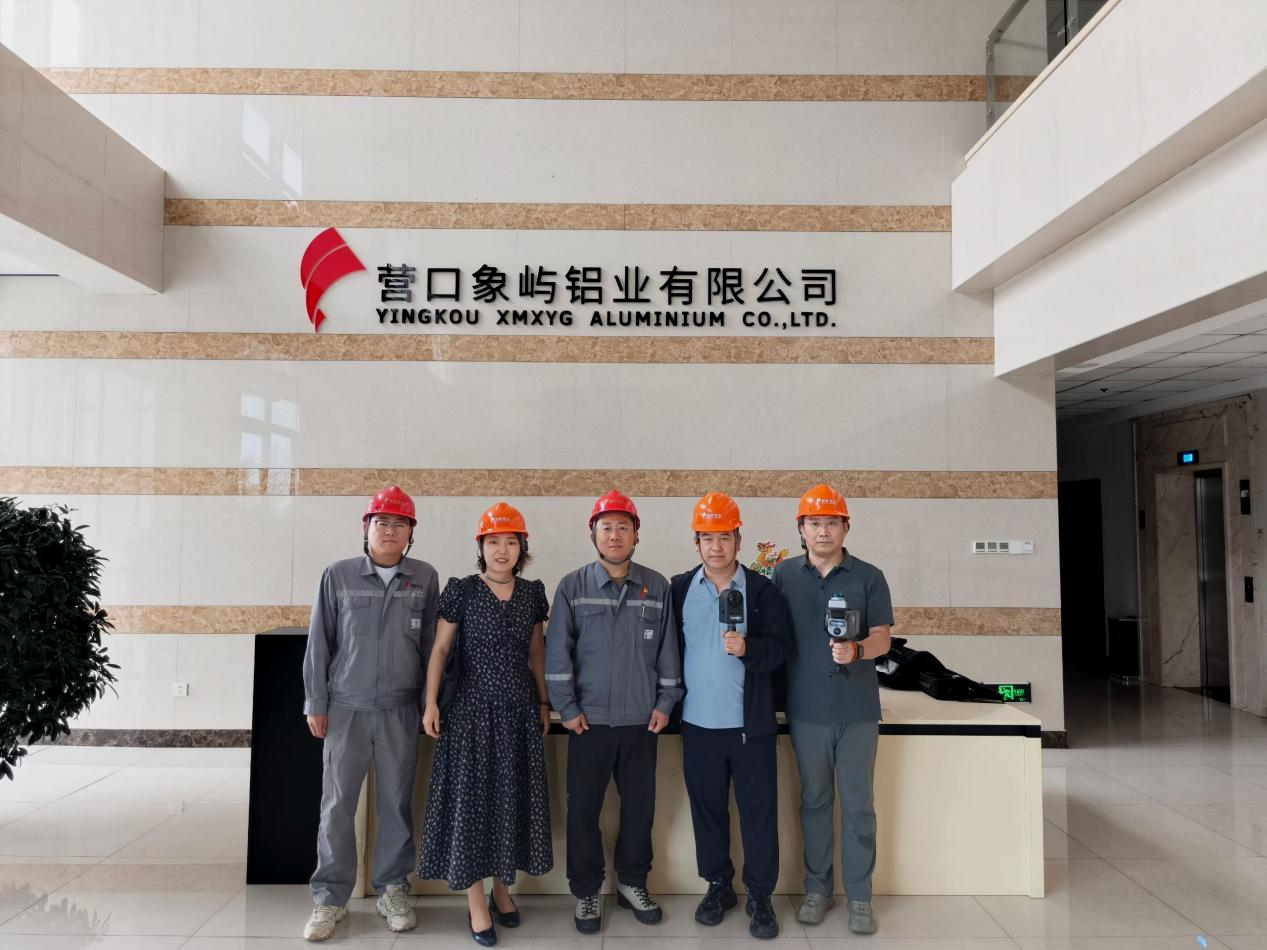 Project team with handheld scanners at the Yingkou industrial facility